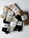 Жіночі шкарпетки UGG Rib Knit Slouchy Crew Socks Чоний One Size 1014832-BLK2 фото 3
